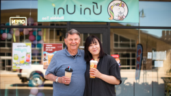 Fanni Xe and mentor Paul Dozier standing outside of Uni Uni Bubble Tea